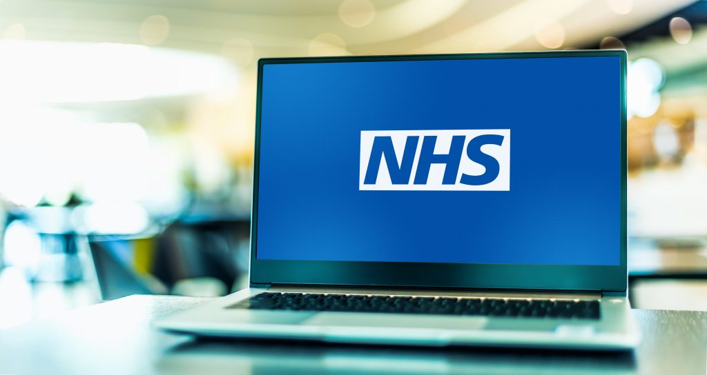 NHS logo on a laptop