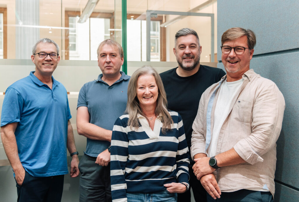 Digital Modus management team smiling and posing for a photograph
