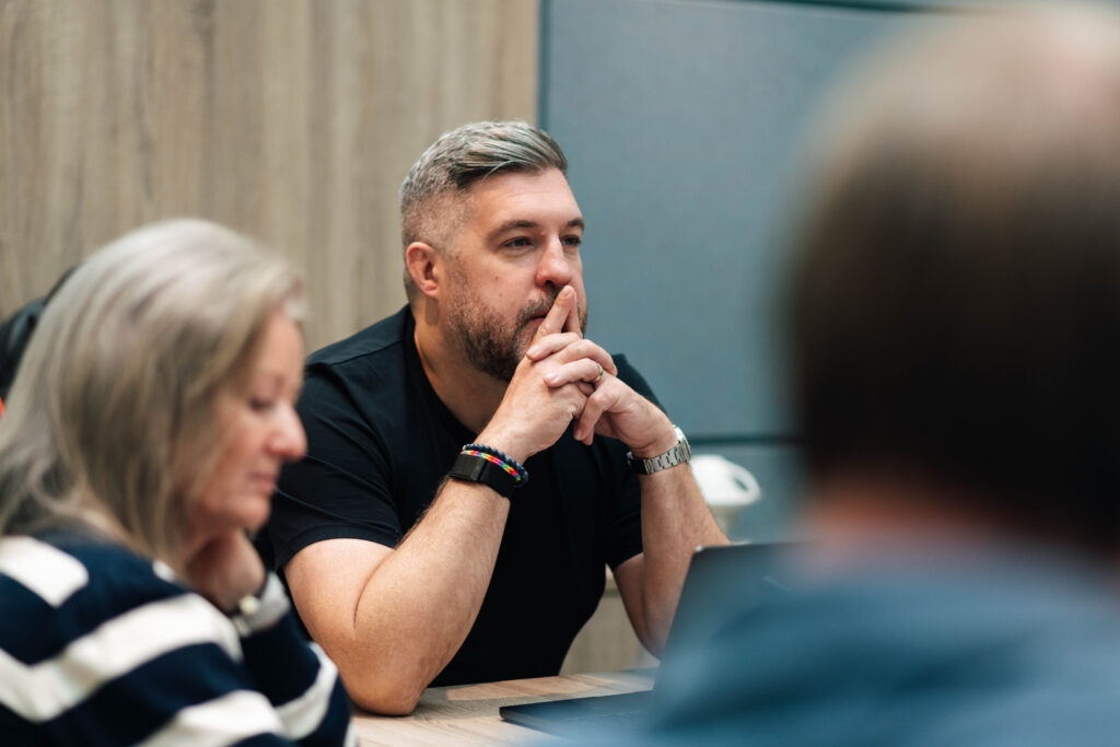 Digital modus members on an ongoing conference room meeting